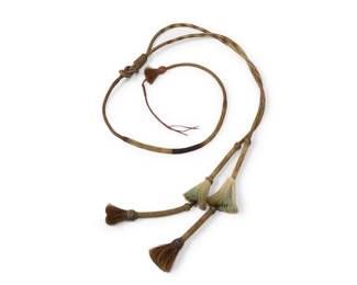 1065 A set of Yuma Prison horsehair reins Late 19th/early 20th century; Yuma Territorial Prison, AZ Woven horsehair Overall: 85" L approximately Estimate: $500 - $700