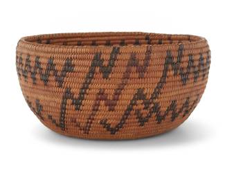 1024 A Washoe or Mono Lake Paiute polychrome basketry bowl Early 20th century; Great Basin The coiled bowl with braided rim above zig-zag bands 2.625" H x 5.625" Dia. Estimate: $500 - $700