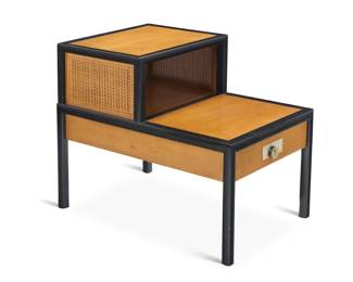 1153 A Baker Furniture wood and caned side table Mid-20th century With metal factory label applied to drawer interior With ebonized frame, caning to side panels, and a single drawer 25" H x 20" W x 30" D Estimate: $200 - $300