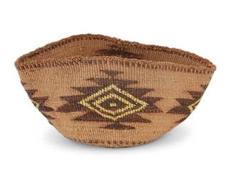 1243 A Klamath polychrome basketry bowl Early/mid-20th century; Northern California/Oregon The twined bowl with imbricated quillwork on the floating serrated diamonds 4.375" H x 10" W x 6.25" D, irregular Estimate: $200 - $400
