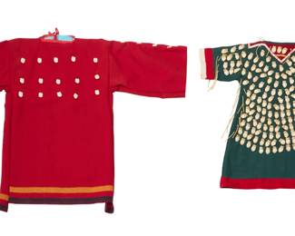 1372 Two Plateau wool shirts with faux elk teeth Mid/late 20th century; Northwest United States/Canada Each shirt/tunic embellished with multiple applied imitation elk teeth front and back, comprising a red striped wool blanket pullover tunic shirt with cotton mix lining, as well as a smaller green and red wool tunic dress with beadwork at the neck and white fabric lining Larger: 31.5" H x 21" W (across back underarms); sleeves: 16" L; Smaller: 28" H x 15" W across back underarms); sleeves: 8" L Estimate: $300 - $500