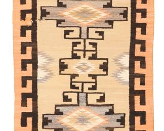 1084 A Navajo regional rug Mid-20th century, Diné Woven in orange, cream, ochre, tan, cream, dark brown, and natural grey wool, with stacked stepped and hooked diamonds within a hooked border 65.5" H x 35" W Estimate: $300 - $500