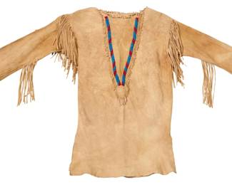 1367 A Plains style child's beaded buckskin shirt Mid-20th century The small long-sleeve shirt with two bands of beaded elements in a V at front, and fringe to shoulders and sleeves 24" H x 14.5" W (across underarms at back); sleeves: 15.75" L Estimate: $200 - $400