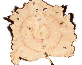 1357 Martin Red Bear (b. 1947, Oglala/Sicangu Lakota) A painted buffalo robe, 1992 Signed and dated: M.Red Bear.92.Lakota Pigment on hide, depicting a yellow, red, black, and white medicine wheel, sacred animals, and five polychrome warriors on horseback 74" H x 81" W Estimate: $1,000 - $1,500