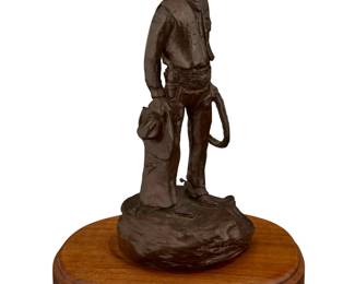 1164 Joe Ed Johnson (20th Century) "Speakin' to the Man," 1975 Patinated bronze on a wood plinth Edition: 5/200 Signed, dated and numbered in the casting: Joe Ed Johnson / © Bronze: 9.625" H x 4.25" W x 4" D; Overall: 11" H x 7.75" W x 6.25" D Estimate: $200 - $300