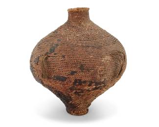 1048 A Paiute basketry water vessel Late 19th/early 20th century; Great Basin The coiled vessel covered in pine pitch, with two braided handles 14" H x 12.25" Dia., irregular Estimate: $300 - $500