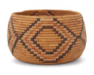 1034 A California Mission polychrome basketry bowl Early 20th century; Southern California A four-color example, the coiled bowl with radiating conjoined diamond motifs 3.125" H x 5.5" Dia. Estimate: $500 - $700