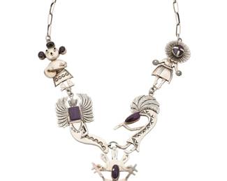 2111 An Esther Wood Navajo sterling silver and sugilite kachina motif necklace Esther Wood (b. 1946, Diné) Late 20th/21st century With etched signature: Esther / Nunez A chunky necklace with various articulated and stamped silver figural links featuring different katsina dancers with set sugilite cabochon accents, suspending a central pendant of a Spirit Dancer 2 pieces 22" L x 3" H 128.7 grams gross Estimate: $800 - $1,200