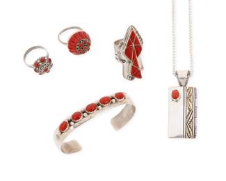 2265 A group of Southwest silver and coral jewelry Late 20th century Five works:  Alvin Monte (b. 20th century, Diné) A Navajo sterling silver, 14K gold and coral pendant necklace Stamped for artist and for sterling and 14K gold A rectangular pendant with applied gold stepped blanket motif banding and set coral cabochon, on a silver chain 20" L x 2" H  Lee and Mary Weebothee (1927-2015, and 1934-1995, Zuni Pueblo) A Zuni sterling silver and cobblestone inlay ring Stamped: Lee/Mary / Zuni A domed ring with cluster set coral and inlay Ring size: 7.75  A group of Southwest silver and set coral jewelry Variously marked for sterling and for maker: D.W. [script] / [tomahawk picto] Comprising a narrow cuff bracelet with row set coral stones, as well as a silver and coral mosaic inlay ring and a cluster set coral ring 3 pieces Cuff: 6.25" total inner C x 0.375" H, gap: 1"; Each ring size: 7  5 pieces total 63.7 grams gross Estimate: $600 - $800