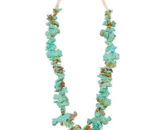 2209 A Frank Tom Navajo carved turquoise fetish necklace Frank Tom (b. 20th century, Diné) Late 20th century Unmarked, with tag denoting artist A single strand necklace with chunky graduated carved turquoise animals including squirrels, birds, heartline bears, fish, seals, sharks, whales, turtles, bison, owls, and mountain lions, suspending a central carved standing bear figure, with a traditional wrapped neck cord 32" L x 2" H 213.5 grams gross Estimate: $400 - $600