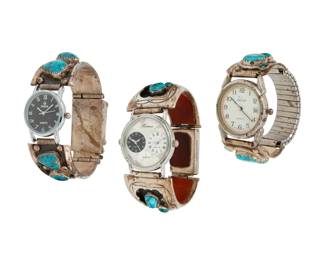 2301 A group of Southwest silver and stone set watch bands with watches Mid/late 20th century The silver ends variously marked: Effie C. / Zuni Comprising three silver and set stone two-piece watch band end sets, including an Effie Calavaza (c. 1927-2019) Zuni watchband set with turquoise and applied silver serpents (each: 1.125" H x 1.5" W), a set with shadowbox set turquoise and a clasp closure (6.75" inner C x 1.25" H, with clasp closed), and one with set turquoise and applied feather accents and a clasp closure (6.5" inner C x 1.125" H, with clasp closed), each attached to a different watch face, and one attached to an expandable metal strap 3 pieces 220.6 grams gross Estimate: $300 - $500