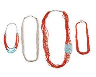 2176 A group of Pueblo style necklaces Mid/late 20th century One illegibly marked Comprising a multi-strand coral beaded necklace with small offset turquoise tabs (32" L), a chunky single strand graduated coral disc necklace (18" L), as well as a multistrand liquid silver necklace with scattered turquoise (25" L), and a diminutive multistrand turquoise and coral necklace with silver terminals (14" L to 9.5" L) 4 pieces 182.8 grams gross Estimate: $500 - $700