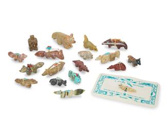 2325 A large group of Zuni carved stone mammalian fetishes Mid/late 20th century, mostly Zuni Pueblo Most variously incised with signature, initials, or artist's cipher Comprising primarily foxes, from artists including John Charles Oombi, Roy Davis, Pat Homer, and Edna Leki, carved from hardstone, turquoise, and pipestone; eleven mounted with offerings 18 pieces Largest: 1.25" H x 2.75" W x 0.625" D; Smallest: 0.375" H x 1.25" W x 0.25" D Estimate: $200 - $400