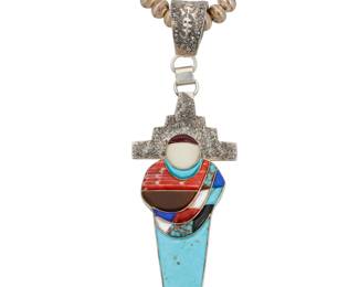 2137 A Southwest sterling silver and multistone inlay pendant necklace Late 20th/21st century Pendant stamped: F / Sterling; necklace stamped to hook: ML [slightly conjoined] A figural pendant with cobblestone channel inlay including turquoise, lapis lazuli, mother of pearl, spiny oyster and sugilite, suspended from a single strand Navajo silver bead choker necklace, by Margaret Lee (b.1952, Diné) 2 pieces 18.5" L x 5" H x 1.5" W 101.3 grams gross Estimate: $500 - $700