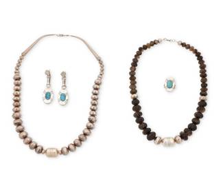 2286 A group of Southwest silver and stone jewelry Late 20th century Four works:  Ric Laselute (b. 20th century, Zuni Pueblo) A set of sterling silver and turquoise jewelry Each stamped: Ric Laselute Comprising a sterling silver oval ring with set turquoise and a pair of matching earrings 3 pieces Ring size: 7; earrings: 2.75" H  Two Southwest bead necklaces Each unmarked [owner's tag indicates J. Nez as maker of stone bead necklace] Comprising a single strand of smokey quartz ridged melon beads with sterling silver barrel bead to center (21" L), as well as a single strand of silver beads with central barrel bead and tapered cone clasp (24" L) 2 pieces  5 pieces total 200.5 grams gross Estimate: $300 - $500