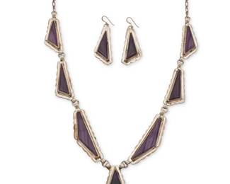 2229 A set of Eric & Carol Fierro Navajo sterling silver and sugilite jewelry Eric and Carol Fierro (each b. 20th century, Diné) 20th/21st century Each stamped: E & C Fierro / Sterling A heavy sterling silver link necklace with six graduated triangular links with set sugilite suspending a large drop pendant, with a pair of matching sugilite earrings 3 pieces Necklace: 27.5" L x 2.5" H; Earrings: 2.625" H 127.8 grams gross Estimate: $400 - $600