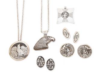 2205 A group of Southwest style silver overlay jewelry Late 20th century Four variously marked for maker and for sterling: RB / Bct / EMT / [peyote bird picto for Gibson Gene] Six works comprising two silver overlay pictorial pendants, one an eagle's head and a pendant/brooch featuring a howling wolf in a landscape, each with a silver chain, as well as a Gibson Gene Navajo/Diné storyteller pendant with profile portrait, and three pairs of Navajo/Diné earrings including a pair with geometric overlay by Everett and Mary C Teller, and two pairs of storyteller earrings, one by Floyd Becenti, Jr, and a pair by Richard Begay 9 pieces Pendants: 2" H; Earrings: 1.5" Dia. to 1.25" H; Chains: 23" L to 22" L 144.4 grams gross Estimate: $200 - $400