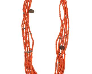 2170 A Pueblo style multistrand coral necklace Mid/late 20th century Unmarked The six-strand coral bead necklace with turquoise bead, silver bead, and antique coin accent spacers, and with a traditional wrapped neck cord 28" L 150.8 grams gross Estimate: $400 - $600