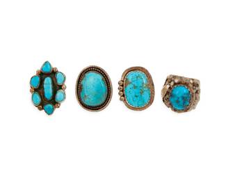 2260 A group of Southwest style silver and turquoise rings Mid/late 20th century Variously marked for maker and/or for sterling: CMC / SL Four rings in various styles and sizes with set turquoise stones comprising a cluster set ring and three chunky single set turquoise rings 4 pieces Ring sizes: 11.5 to 9 109.2 grams gross Estimate: $300 - $500