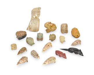 2321 A large group of Zuni carved mouse fetishes Mid/late 20th century, mostly Zuni Pueblo One with incised signature and inscription: Alvert LAMY / ZUNI / NM From artists including Alvert Lamy, Roy Davis, and Patricia Wayne, carved from hardstone, shell, pipestone, tagua nut, and antler; most with inset turquoise or jet eyes 18 pieces Largest: 3.5" H x 2.125" W x 1.75" D; Smallest: 0.75" H x 0.875" W x 0.75" D Estimate: $200 - $400