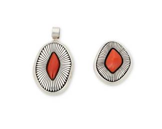 2158 A set of Herman Vandever Navajo sterling silver and coral jewelry items Herman Vandever (b. 1964, Diné) Late 20th/21st century Each with etched signature verso Two works featuring a sterling silver chunky shadowbox set coral pendant, and a matching shadowbox set coral ring 2 pieces Pendant: 2.625" H x 1.5" W; Ring size: 8.25; 1.625" H 78.1 grams gross Estimate: $300 - $500
