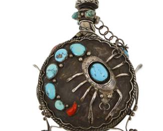 2013 A large Southwest silver and set stone scorpion flask Mid-20th century With applied mark to base: [sun picto with mountains within] The large ornate round flask with set turquoise and coral accents, featuring an applied silver scorpion motif to one side, and applied leaves to the reverse, with additional applied silver feathers and rope wire edging, and a set crystal and turquoise screw-top finial stopper to spout, with side brackets and feet for stability 6.75" H x 4.625" W x 2" D 412.8 grams gross Estimate: $700 - $900