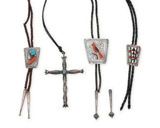 2253 A group of Southwest silver jewelry Mid/late 20th century Variously marked for maker or for sterling Four works comprising a large cast sterling silver cross pendant with set turquoise, on a leather cord, as well as three sterling silver and stone set bolos, including a Benjamin Becenti Navajo/Diné coral and stone inlay bird motif bolo, with a red cardinal and foliate branches, a geometric stone inlay bolo slide, and a set turquoise and coral bolo slide, two bolos suspended on a braided leather strap, two with tapered silver tips 4 pieces Pendant: 4.75" H x 3.375" W; Largest bolo slide: 2.25" H x 2.125" W; Smallest: 1.87" H x 1.125" W; cords: 39" L to 34" L 136.8 grams gross Estimate: $500 - $700