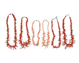 2221 A group of Southwest style branch coral necklaces Mid/late 20th century Unmarked Comprising six single strand necklaces of graduated branch coral in various colors and sizes, three with hook clasps and three with barrel clasps 6 pieces Largest: 22.5" L x 1.25" H; Smallest: 17" L x 1" H 191.2 grams gross Estimate: $200 - $400