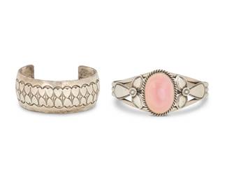 2183 Two Southwest sterling silver cuff bracelets Mid/late 20th century Each stamped for sterling, one stamped: M. Spencer [for Mark Spencer or Mary Ann Spencer, Diné] Comprising a M. Spencer Navajo three wire cuff with central set pink stone and applied silver accents (6.75" total inner C x 1.125" H, gap: 1") as well as a wide sterling cuff with extensive stampwork (6.375" total inner C x 1" H, gap: 1.375") 2 pieces 81.7 grams gross Estimate: $200 - $400