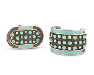2021 A set of Jobeth Mayes Zuni sterling silver and turquoise jewelry Jobeth D. Mayes (b. 20th century, Zuni Pueblo) Late 20th century Each with etched signature: Jobeth Mayes Maize / Zuni / [cornstalk]; cuff etched: Size 5 1/2 Comprising a wide cuff bracelet with three rows of shadow set turquoise cabochons alternating with applied silver balls, and edged with turquoise mosaic channel inlay, together with a matching oval belt buckle 2 pieces Cuff: 6.625" total inner C x 1.875" H, gap:1.375"; Buckle: 1.75" H x 2.875" W, belt bar: 1.375" 120.4 grams gross Estimate: $400 - $600