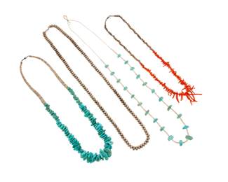 2179 A group of Pueblo style necklaces Mid/late 20th century Unmarked Four works comprising a chunky single strand necklace of graduated turquoise and heishi shell beads (31" L), a single strand of small turquoise tabs alternating with white heishi shell spacers (40" L), as well as a necklace of graduated branch coral and silver beads (29" L), and a single strand of stamped silver saucer disc beads (38" L) 4 pieces 355.9 grams gross Estimate: $700 - $900
