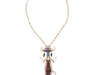 2112 An Esther Wood Navajo sterling silver Firekeeper kachina pendant necklace Esther Wood (b. 1946, Diné) Late 20th/21st century With etched signature verso: Esther W; chain stamped: LE / Sterling A tall katsina figure pendant in sterling silver with set turquoise and sugilite to the body and with set amethyst and onyx earrings, suspended on a chunky sterling silver chain 24" L x 5.25" H x 2.25" W 115.2 grams gross Estimate: $800 - $1,200