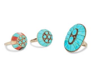 2077 A group of Lee & Mary Weebothee Zuni silver and set stone rings Lee and Mary Weebothee (1927-2015, and 1934-1995, Zuni Pueblo) Mid-late 20th century Each stamped: Lee/Mary / Zuni Three sterling silver and cobblestone inlay rings including an oval ring with turquoise inlay and set stones, as well as two domed rings, each with cluster set turquoise, one with turquoise inlay and one with multistone inlay 3 pieces Ring sizes: 7.5 & 7 23.6 grams gross Estimate: $400 - $600