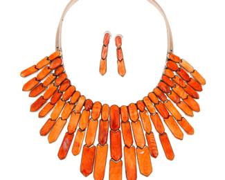 2054 A set of Federico Jimenez Southwest sterling silver and spiny oyster jewelry Federico Jimenez (b. 1941, Mixtec) Late 20th/21st century Stamped: JF [conjoined] / Sterling Comprising a large silver hinged collar bib necklace with graduated articulated pointed segments of set orange spiny oyster, with a back clasp closure, and with a pair of matching earrings 3 pieces Necklace: 15.75" inner C x 3.5" H; Earrings: 1.875" H 320.3 grams gross Estimate: $1,500 - $2,000