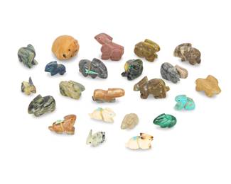 2322 A large group of Zuni carved rabbit fetishes Mid/late 20th century, mostly Zuni Pueblo Each unmarked From artists including Patricia Wayne, Louise Wallace, Melissa Quam, and Daisy Natewa, carved from hardstone, tagua nut, pipestone, malachite, and bone; most inset with turquoise or jet eyes or accents, five mounted with offerings 22 pieces Largest: 1.25" H x 1.375" W x 1" D; Smallest: 0.625" H x 0.875" W x 0.375" D Estimate: $200 - $400