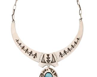 2148 A Herman Vandever Navajo sterling silver and turquoise collar necklace Herman Vandever (b. 1964, Diné) Late 20th/21st century Etched signature verso A hinged link collar necklace with silver overlay figural and geometric motifs, with a central oval pendant with shadowbox set turquoise cabochon 18" L x 2.25" H 105.8 grams gross Estimate: $700 - $900