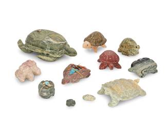 2318 A group of nine Zuni carved stone turtle and frog fetishes Mid/late 20th century, mostly Zuni Pueblo Most variously incised with signature, initials, or artist's cipher From artists including Louise Singer, Ulysses Mahklee, and Herbert Him, carved from various hardstones and one pipestone; most with inset turquoise eyes or accents, together with one frog 10 pieces total Largest: 1.5" H x 4.75" W x 2.75" D; Smallest: 0.25" H x 0.75" W x 0.7625" D Estimate: $200 - $400