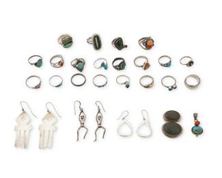 2311 A group of Southwest style silver jewelry Mid/late 20th century Thirteen variously stamped for sterling and for maker: Dilia / A. VAC / T / Bell / Taxco, Mexico, [Eagle 3] / M. Fowler / LA A large group comprising twenty silver, set stone, or turquoise rings in various styles and sizes including bezel set and mosaic stone inlay, together with two set stone pendants and three pairs of sterling silver earrings in various modernist styles 28 pieces Ring sizes: 8.75 to 3.5; Pendants: 1.5" H & 1.25" H; Earrings: 2.75" H to 1.625" H 105.4 grams gross Estimate: $200 - $400