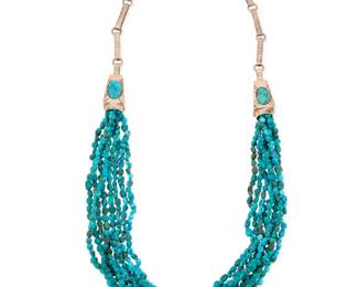2274 A Ric Laselute Zuni sterling silver and Kingman turquoise necklace Ric Laselute (b. 20th century, Zuni Pueblo) Late 20th century Stamped: Ric Laselute The necklace featuring eight strands of small Kingman turquoise nuggets suspended from two chunky set turquoise and sterling silver terminals, with a large silver clip chain clasp 28" L 135.2 grams gross Estimate: $700 - $900