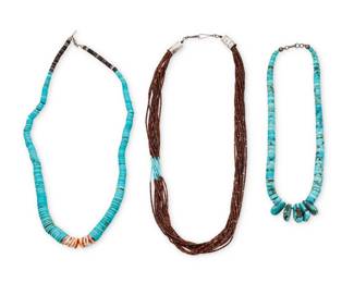 2178 A group of Pueblo style turquoise and heishi necklaces Mid/late 20th century Three works: Annie Cowboy (b. 20th century, Diné) A multistrand olive shell and turquoise heishi necklace Terminals stamped: A The fifteen-strand fine brown shell heishi necklace with scattered fine turquoise and silver terminals 25" L A group of Southwest Pueblo style turquoise necklaces Unmarked Comprising a graduated rolled turquoise and shell necklace (24.5" L), and a chunky rolled turquoise necklace suspending five turquoise tabs (19" L) 2 pieces 3 pieces total 176.7 grams gross Estimate: $600 - $800