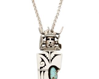 2143 A Bennie Ration Navajo sterling silver and turquoise deer kachina necklace Bennie Ration (b. 1955, Diné) Late 20th/21st century Stamped: B.R. / Sterling / [talon picto] A sterling silver deer pendant/brooch with a shadowbox inset turquoise stone and silver overlay geometric accents, suspended from a silver chain 2 pieces 18" L x 3" H x 1.125" W 59.7 grams gross Estimate: $300 - $500