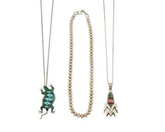 2283 A group of Southwest sterling silver jewelry Late 20th/21st century Three works:  Richard Begay (b. 1943, Diné) A Navajo sterling silver and stone inlay corn necklace Stamped: RB / Sterling A pictorial pendant of an ear of corn with turquoise, coral, lapis lazuli and pink stone sculptural inlay and silver leaves, suspended from a silver chain 1.75" L x 2.5" H  Margaret Lee (b. 1952, Diné) A Navajo sterling silver bead necklace Stamped to hook: ML [slightly conjoined] /Sterling A heavy single strand of round silver beads, with hook closure 18.5" L  A Southwest-style silver and stone inlay pictorial necklace Etched: PVB A turquoise and malachite stone inlay Gila monster lizard pendant/brooch, on a silver chain 22" L x 2.75" H  3 pieces total 81.4 grams gross Estimate: $300 - $500