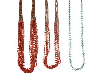 2173 A group of Pueblo necklaces Mid/late 20th century 3 works:  Josephine Coriz [Coris] (b. 20th century, Kewa) Two Santo Domingo Pueblo multistrand coral and heishi necklaces Unmarked; each with tag denoting artist Comprising a ten-strand necklace with fine coral beads and fine brown shell heishi spacers (27" L), as well as a five-strand necklace with small branch coral alternating with fine heishi (25.5" L), each with silver cone clasps 2 pieces  A Pueblo-style turquoise and heishi necklace Unmarked A single strand with graduated turquoise tabs and fine brown shell heishi spacers 28" L  3 pieces total 136.2 grams gross Estimate: $700 - $900