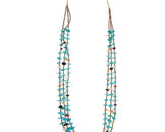 2174 A Pueblo style turquoise and heishi necklace Mid/late 20th century Unmarked Comprising a three-strand necklace with graduated small tab turquoise alternating with various stone and shell beads, with heishi spacers 37" L 90.9 grams gross Estimate: $300 - $500