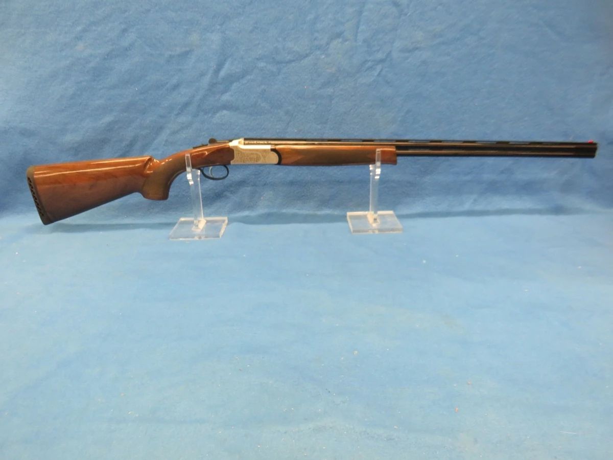 Lot 11. TriStar over/under 410 shotgun. S/N KRU085726. 28" vent rib barrels. Includes original box. Excellent condition.