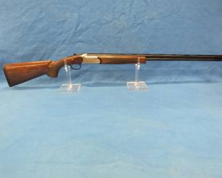 Lot 11. TriStar over/under 410 shotgun. S/N KRU085726. 28" vent rib barrels. Includes original box. Excellent condition.