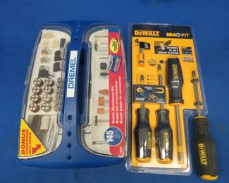 Lot 36. Dremel accessory kit and a set of DeWalt screwdrivers