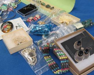 Lot 48. Costume jewelry, including jade beads and a pearl necklace, needs re-stringing, and the necklace and earrings are Indian handmade sterling silver.