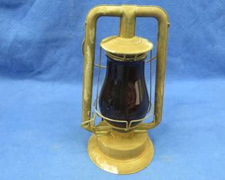 Lot 41. Vintage Richard Strong Co. kerosene lantern with a Red globe