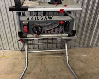 Lot #77 Skilsaw SPT70WT Portable 10in Worm Drive Table Saw with Folding Stand